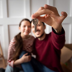 A Man Holding a Key