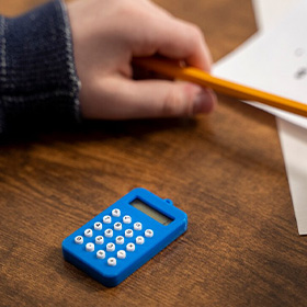 A Hand Holding a Pencil